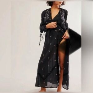38. NWOT Free People Chasin' Spring Maxi Bodysuit